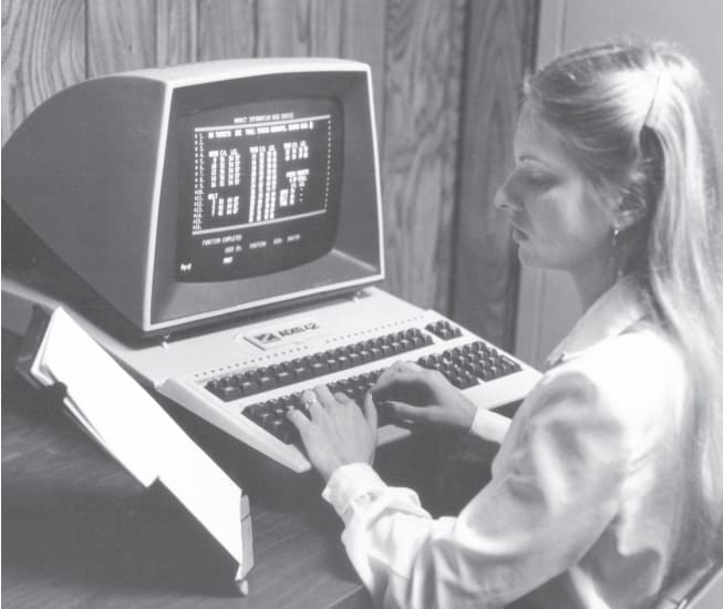 Lynn Dekovitch at early COMTELL computer