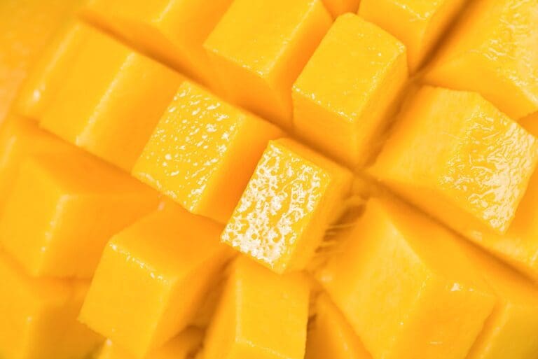 Closeup of mango slice texture background